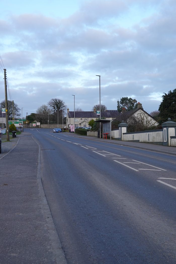 The same road through Clough today, quiet and empty.