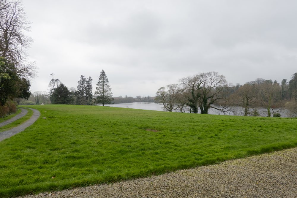 The drive curving past one of the demesne lakes on the way in.