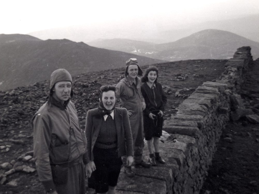 Papa and his group, two soldiers and two young women, up by the Mourne Wall in 1942.